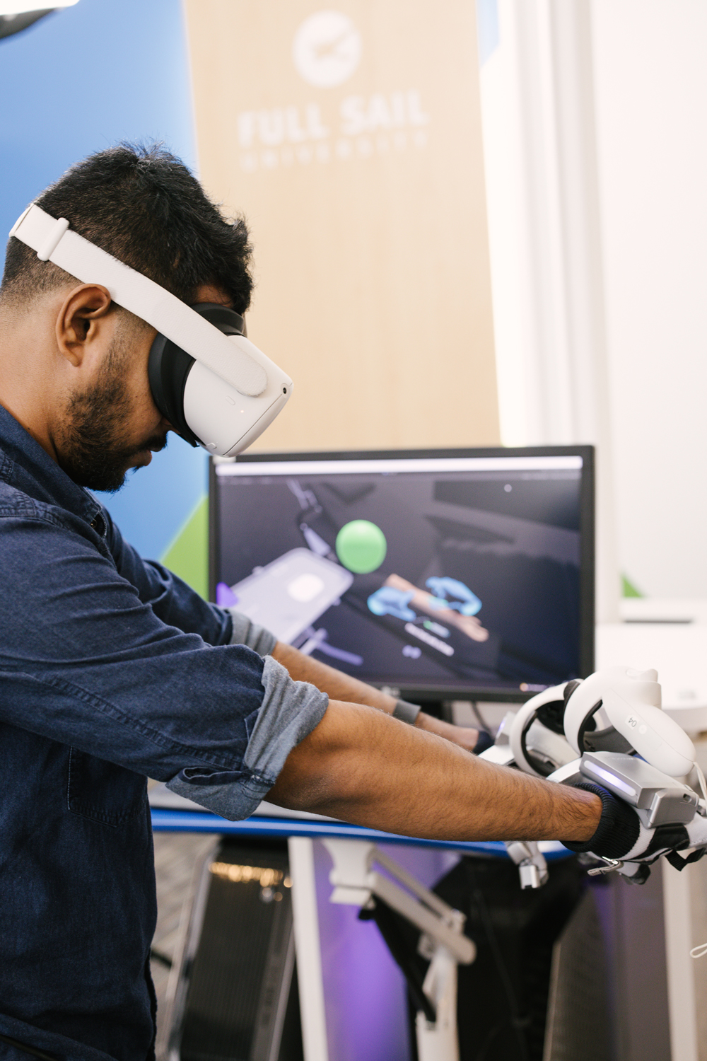 A lab tech tests out virtual reality learning