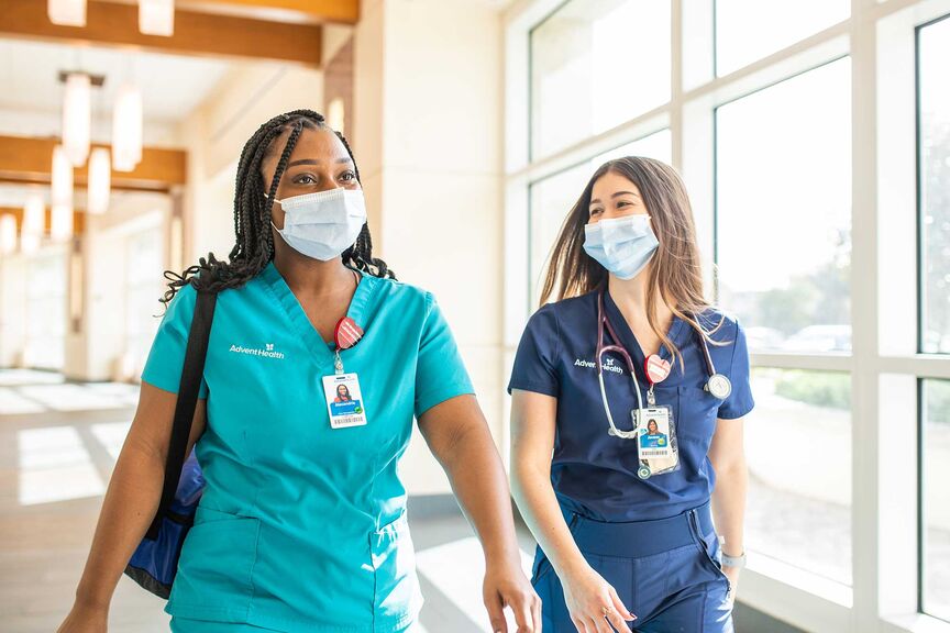 Nurses walking down a hallway
