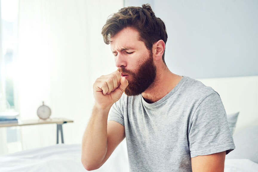Man coughing