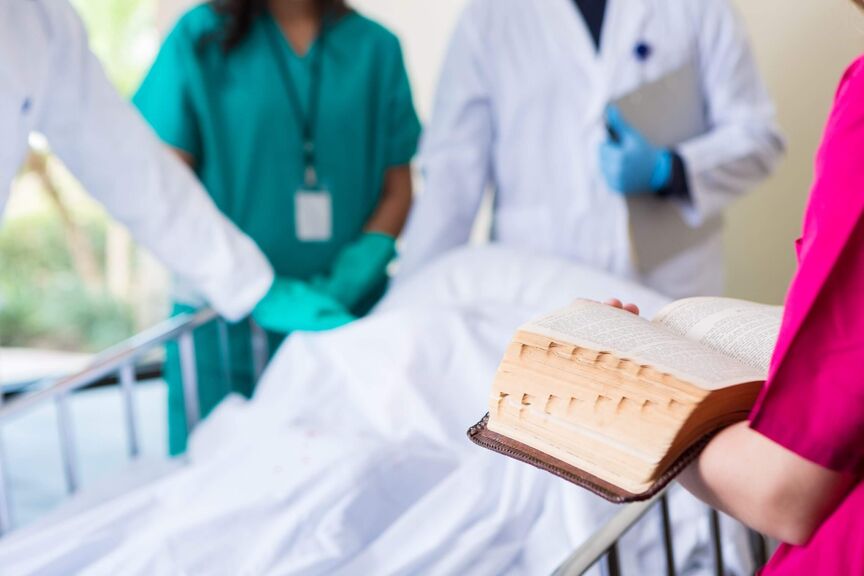 hospital-bible-chaplain-GettyImages-528134817-scaled
