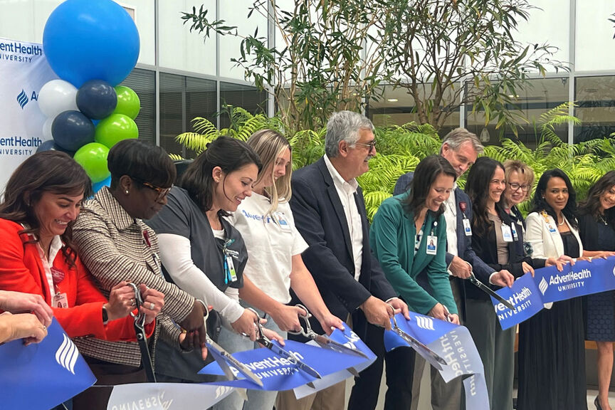 AdventHealth University leaders cut the ribbon at the ribbon cutting ceremony in Denver, Colorado.