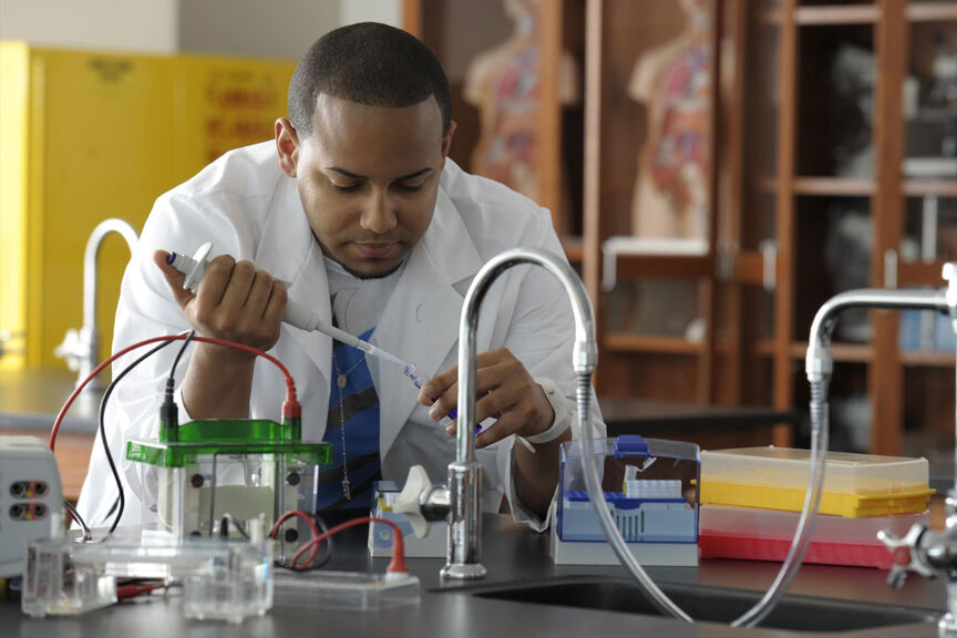A student conducting a chemistry experiment