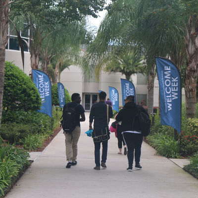 Students walking on campus during welcome week