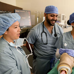 Nurse anesthesia students practicing intubation procedures in the skills lab