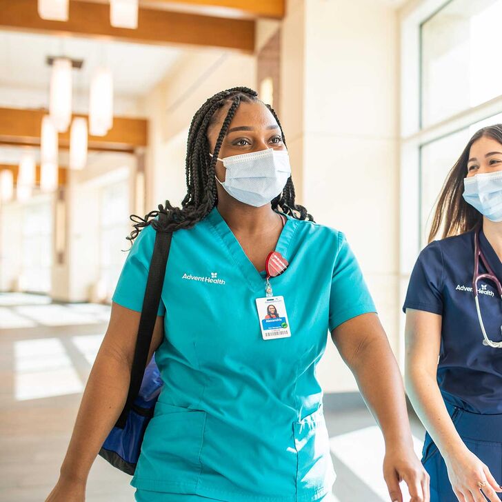 Nurses walking down a hallway