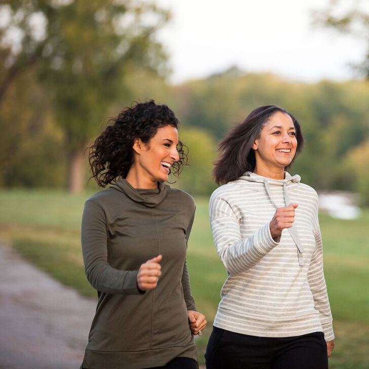Three women walking in the park