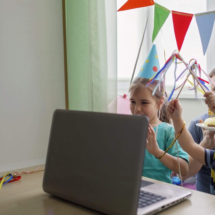 Childrens birthday party with laptop