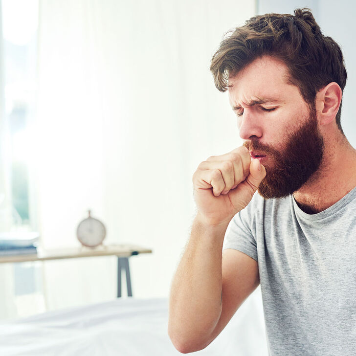Man coughing
