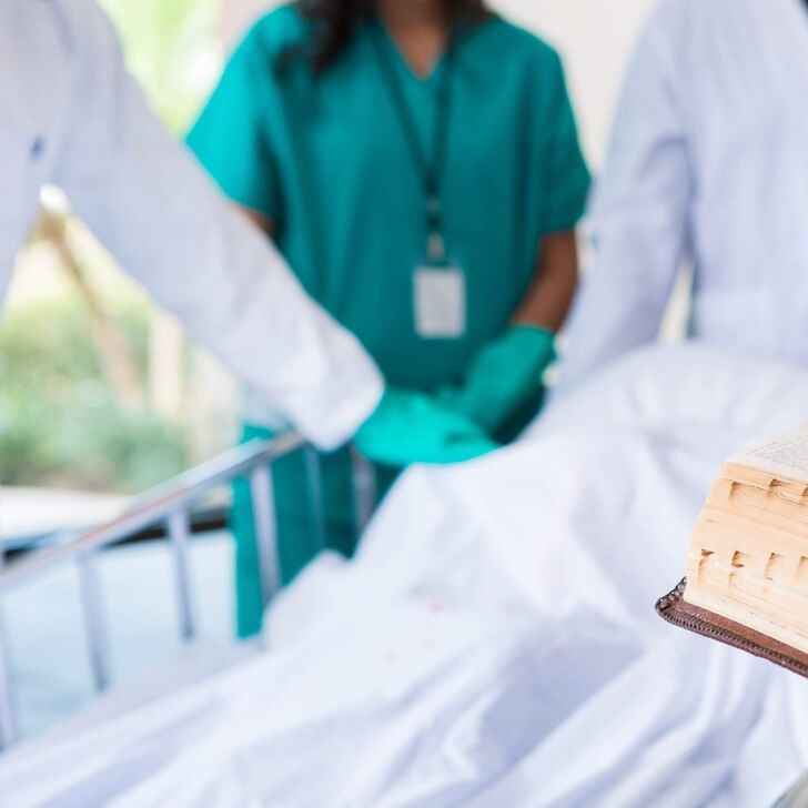 hospital-bible-chaplain-GettyImages-528134817-scaled