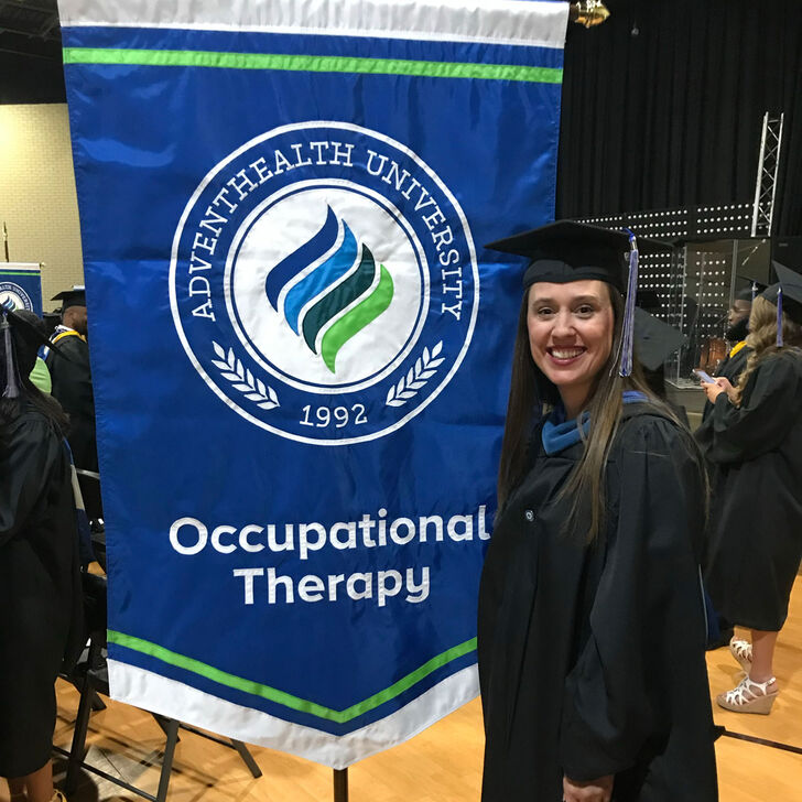 Image of Bryn Nadeau a graduate of the occupational therapy program in regalia.